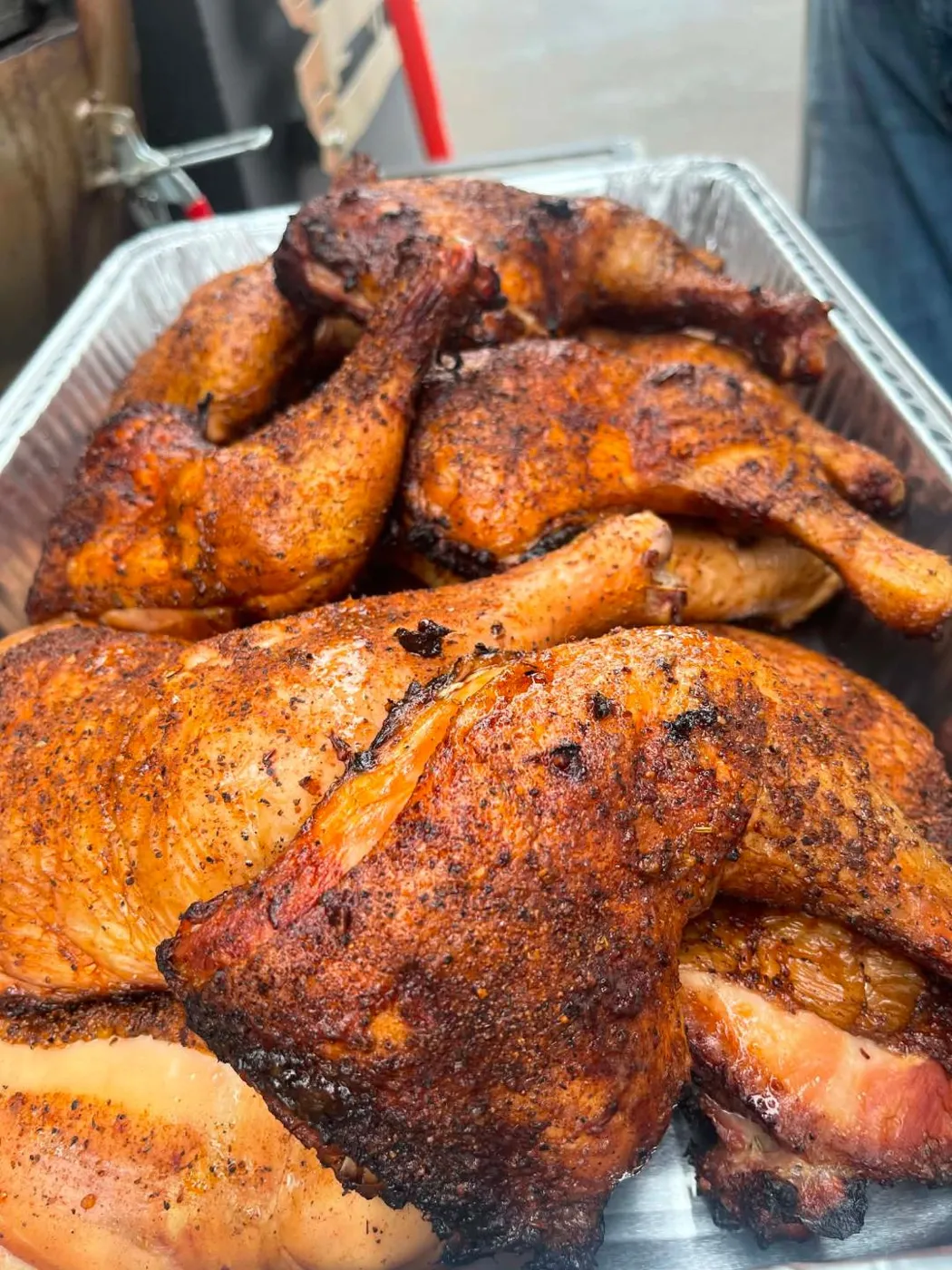 Pan of smoked chicken quarters