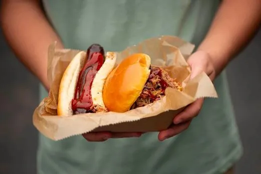 Smoke Show Dog and pulled pork sandwich